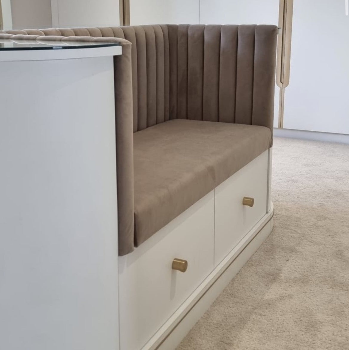 dressing room bespoke velvet seat with satin brass pull knobs on seated cabinetry