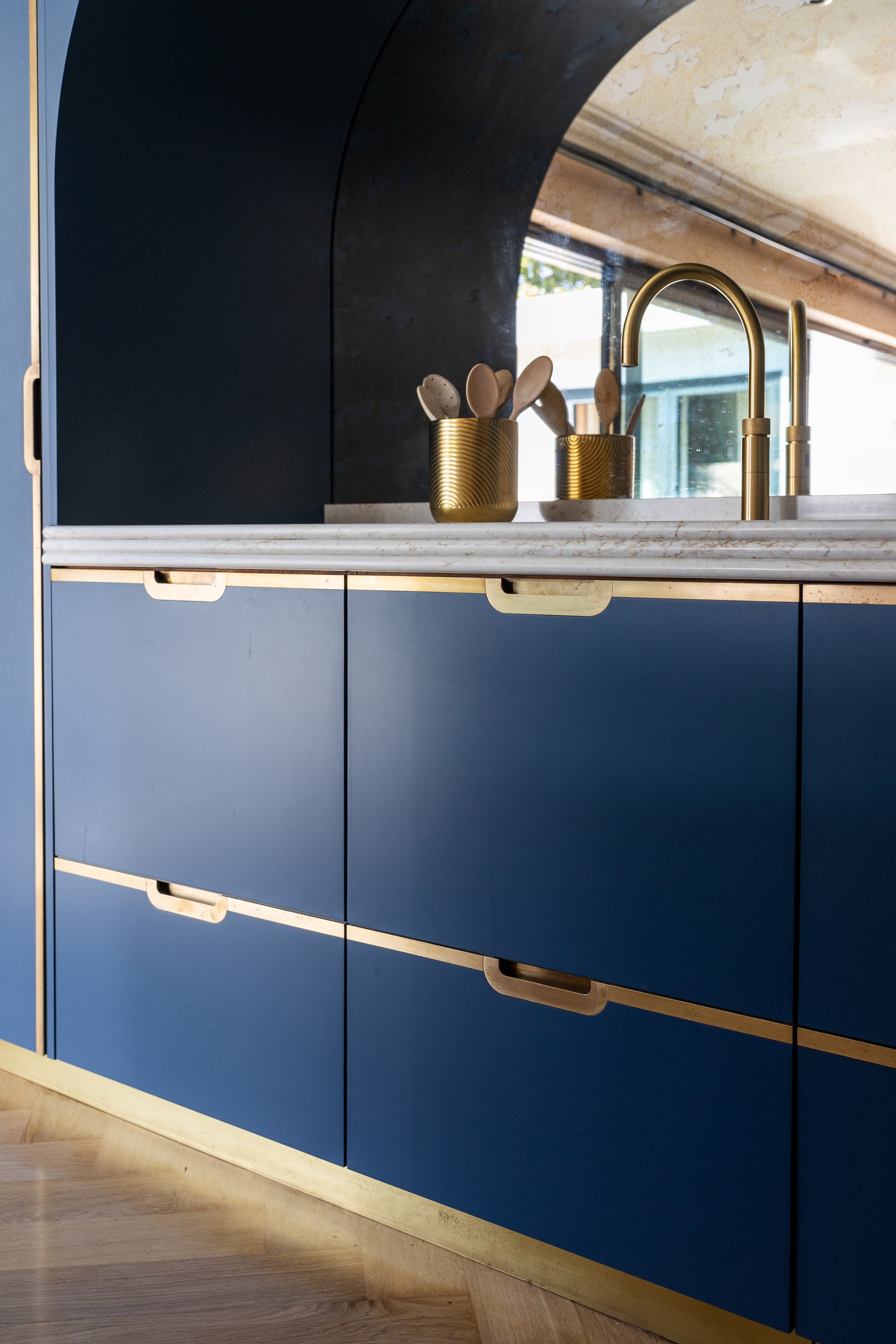 modern art deco inspired kitchen - woodworks brighton - brass inlay handle blue kitchen 2024 trend