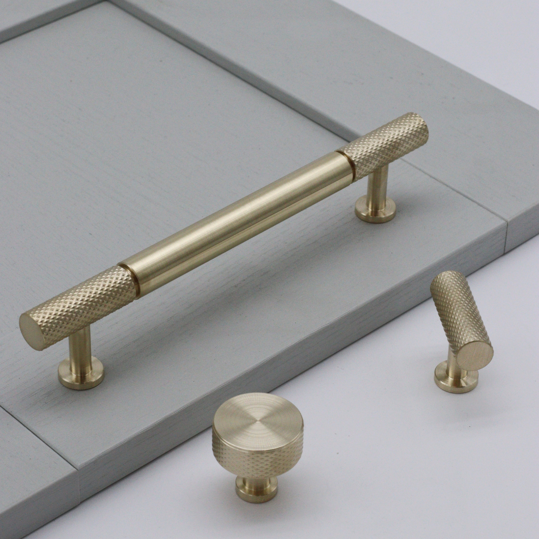 clemo + finch cranbrook collection in lacquered satin brass. knurled kitchen cabinetry hardware 