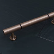 Eastcott 12.5mm Pull Bar Handle — solid brass cylindrical pull bar handle, hand-finished in Tonbridge, Kent. Shown in Satin Brass.