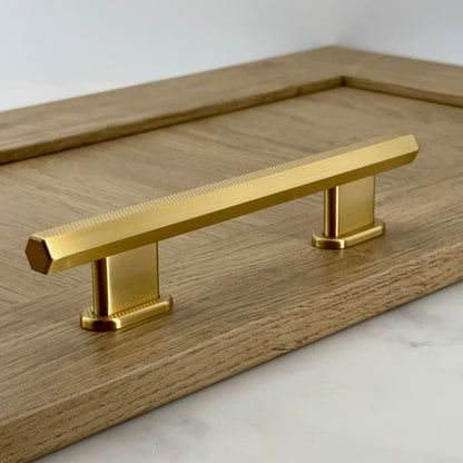 Sennen Hex Pull Bar Handle — solid brass cylindrical pull bar handle, hand-finished in Tonbridge, Kent. Shown in Satin Brass.