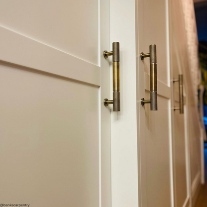 antique bronze (brushed brass) 210mm cabinetry pull handles in hallway cupboards - Gary Banks Carpentry