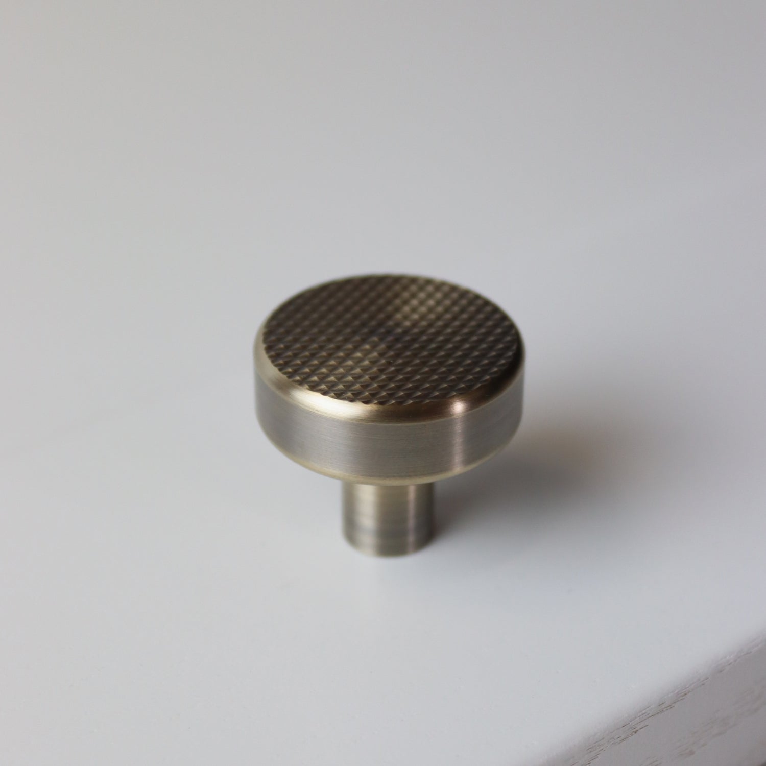 bude cabinetry pull knob with flat knurl detail in vintage antique bronze
