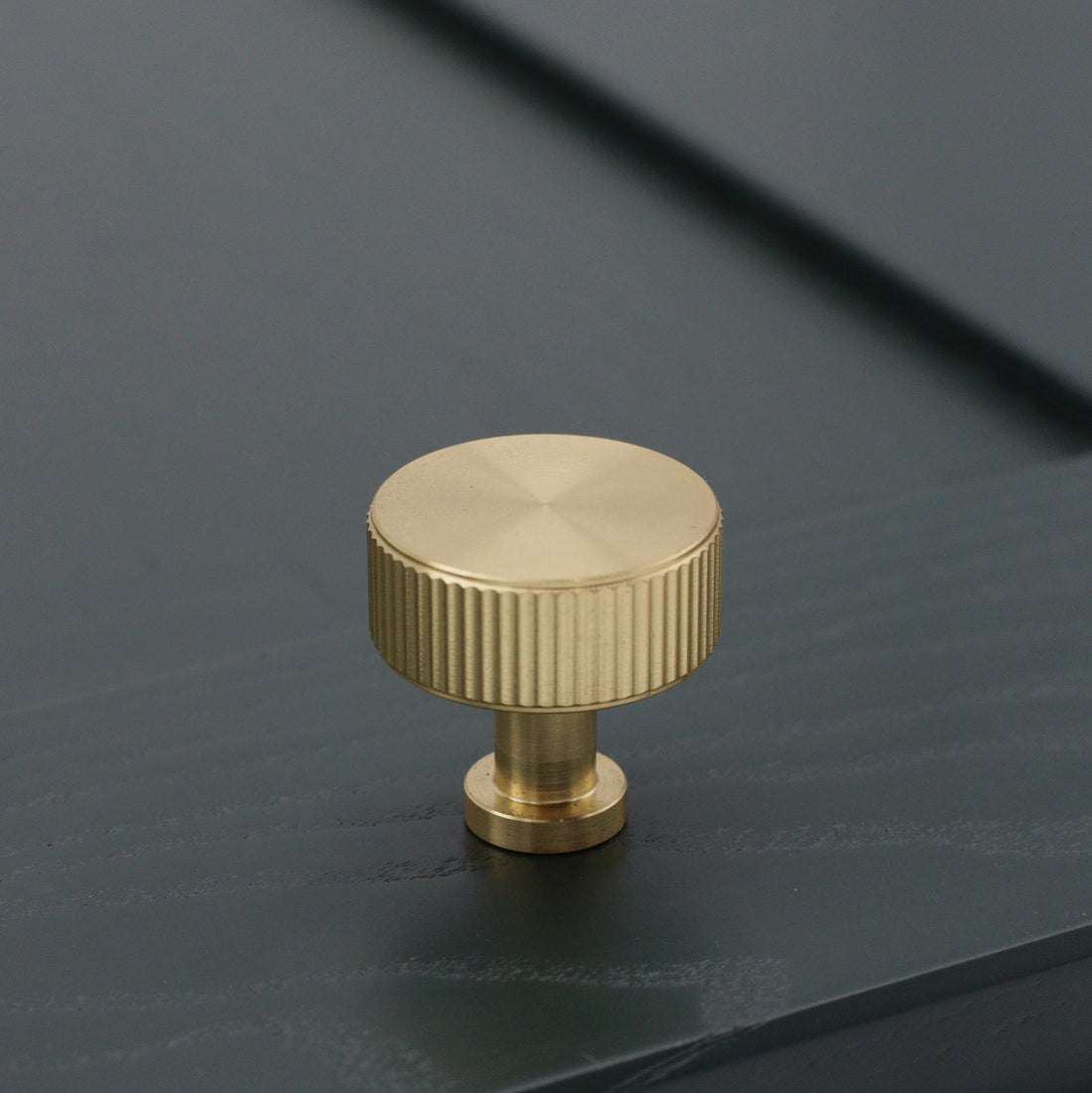 satin brass fluted pull knob on dark cabinetry - Callington Collection Clemo + Finch, Kent