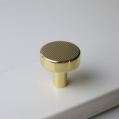 bude pull knob in polished brass for modern cabinetry with flat knurl detail. herbert direct kent 